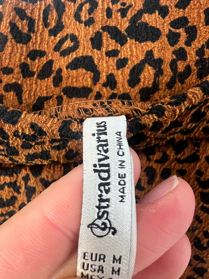 STRADIVARIUS . Falda corta animal print elástica . T M