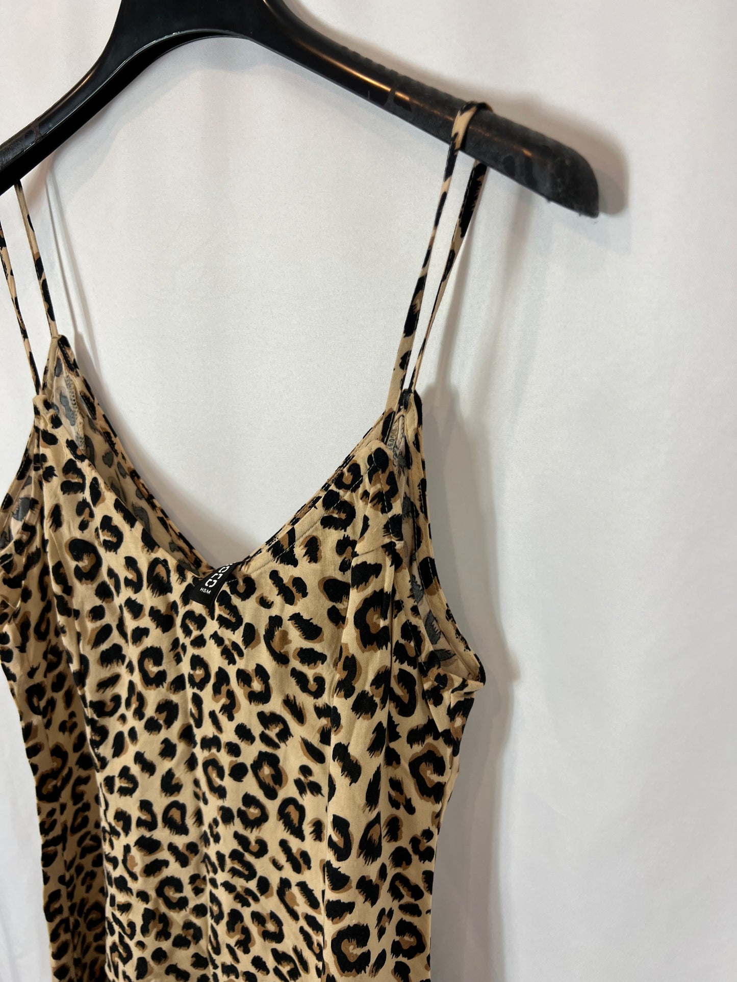 H&M. Vestido corto animal print T.34