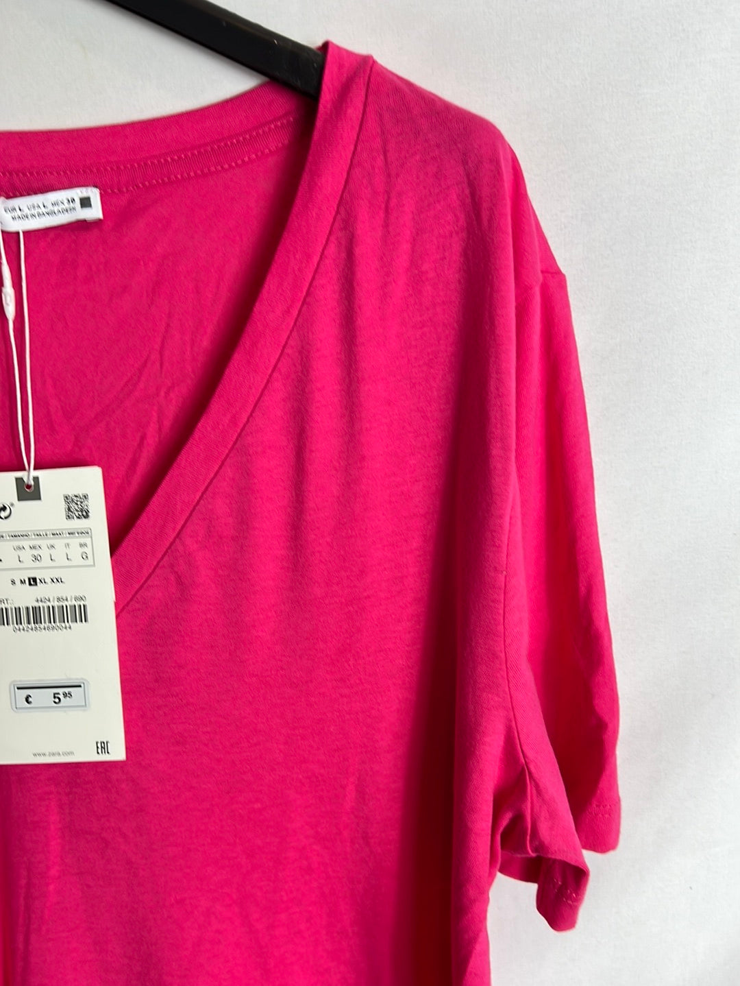 ZARA. Camiseta rosa fucsia. TL