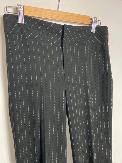 FORMULA JOVEN. Pantalón pata ancha negro raya blanca. T 38