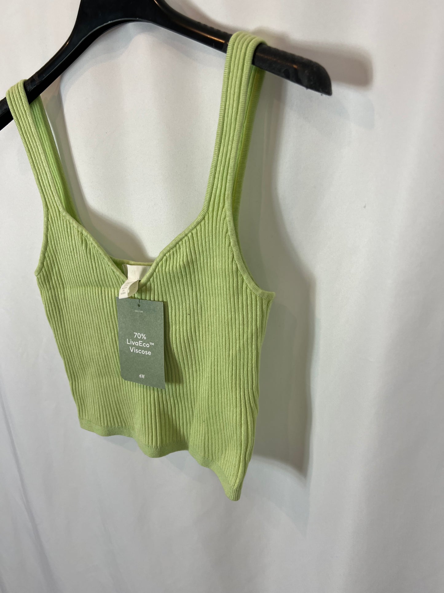 H&M. Top punto verde canalé T.s