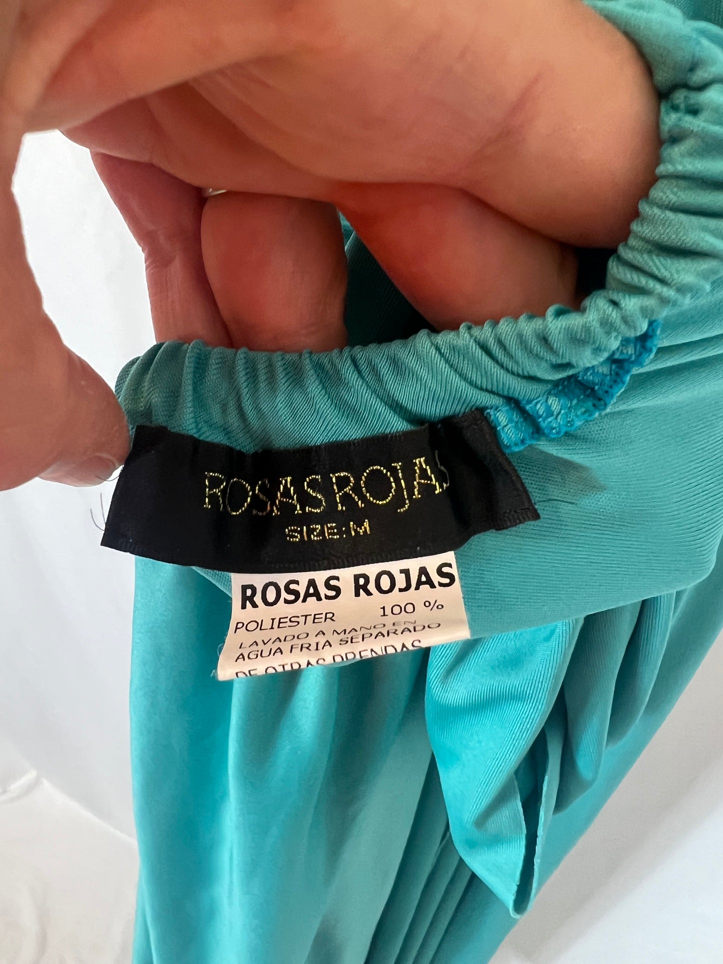 ROSAS ROJAS. Vestido escote lazada azul  T.m