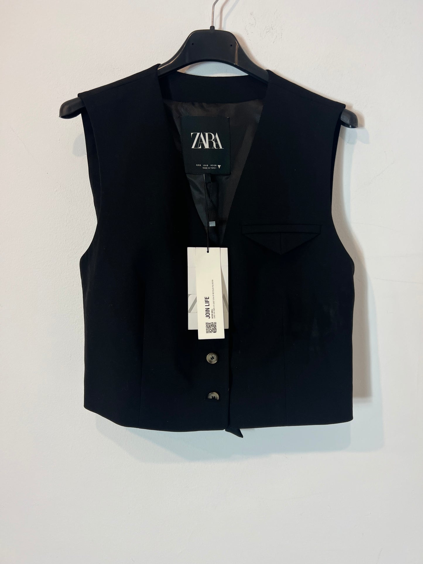 ZARA. Chaleco negro botones T.s