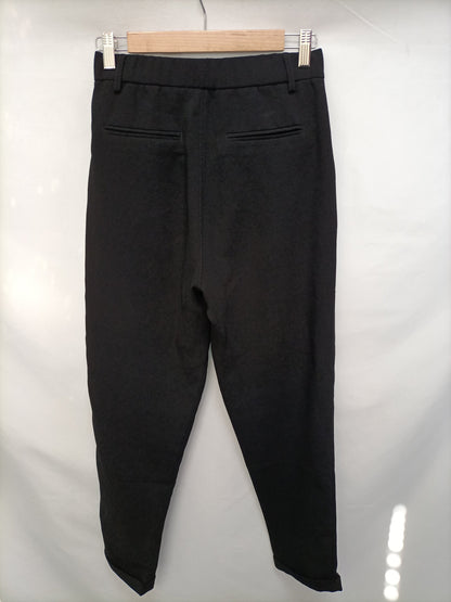 PULL&BEAR. Pantalón negro fluido T.s