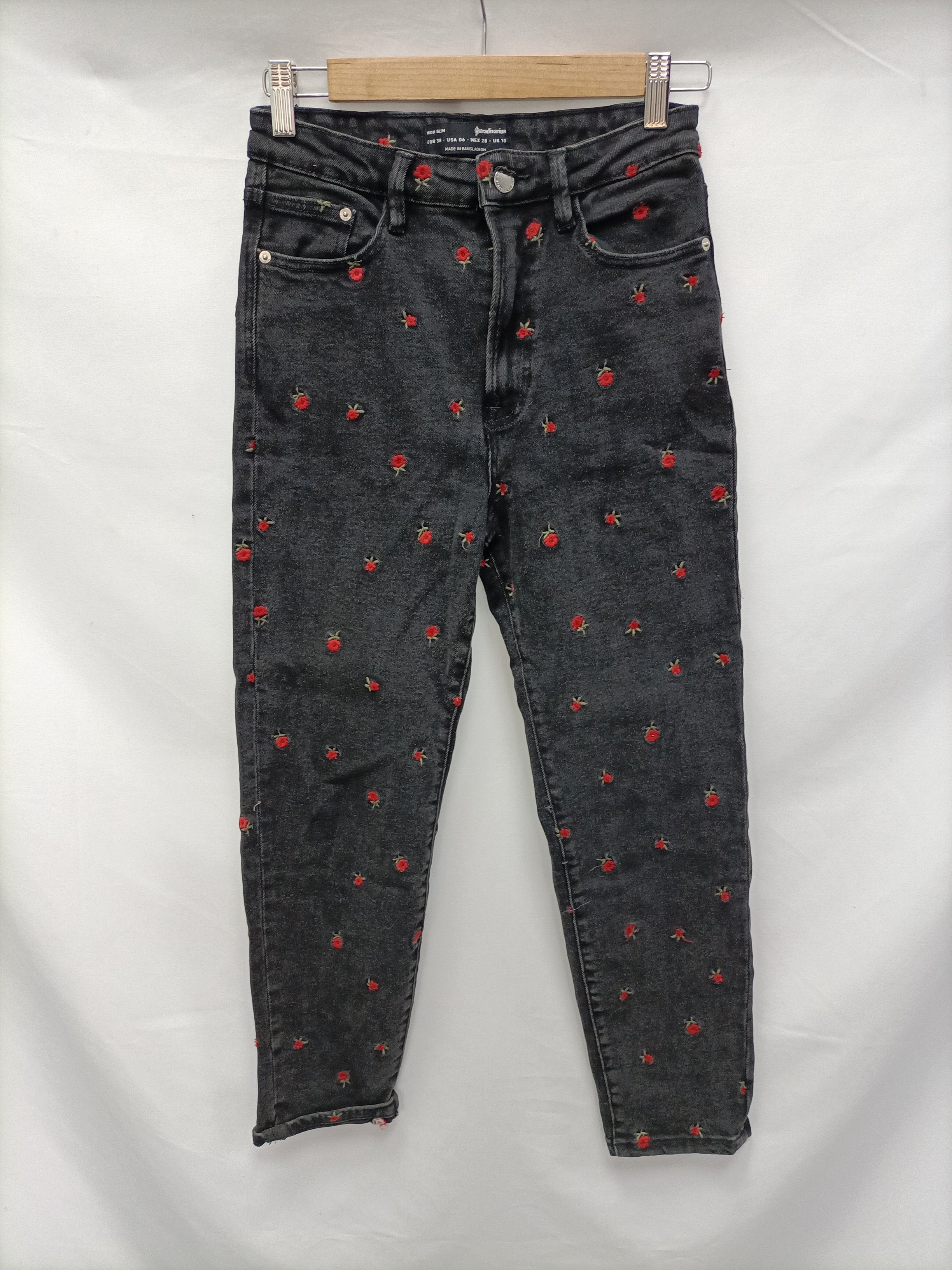 Pantalones flores shops stradivarius