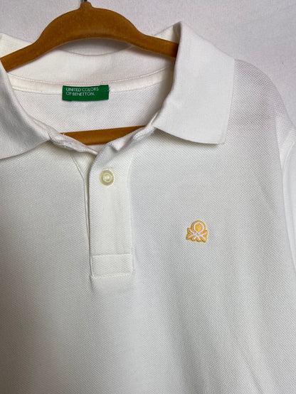 BENETTON. Polo blanco logo T. 8-9 años