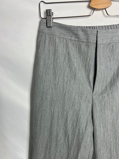 TCN. Pantalón gris jaspeado pata ancha. T 38