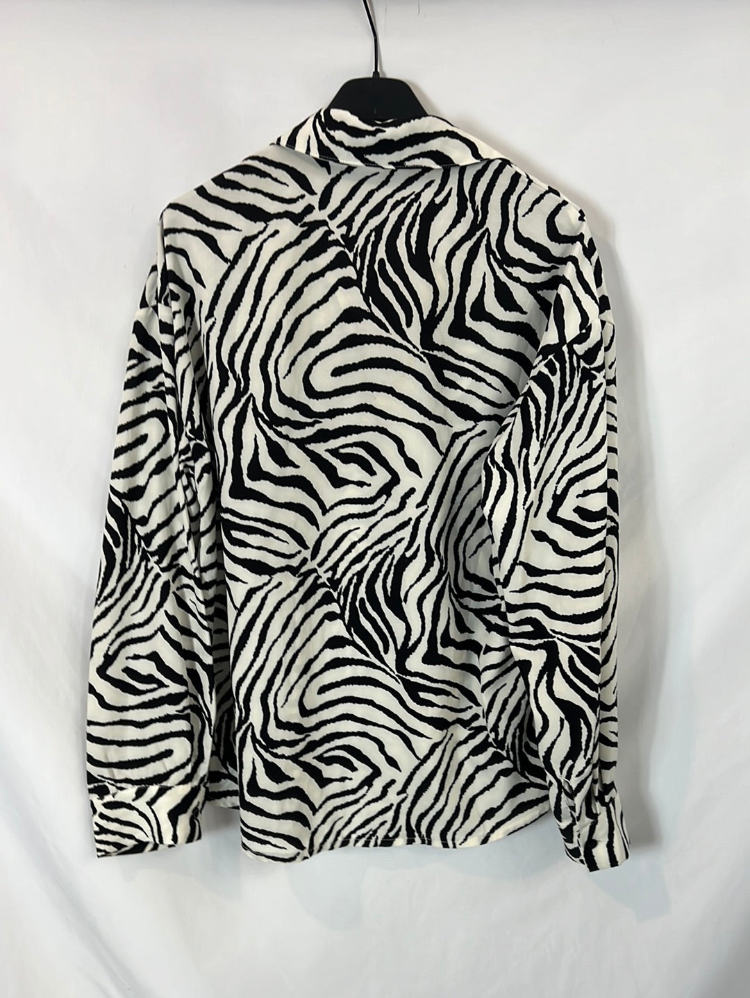 LTL STORE. Blusa fluida animal print T.s