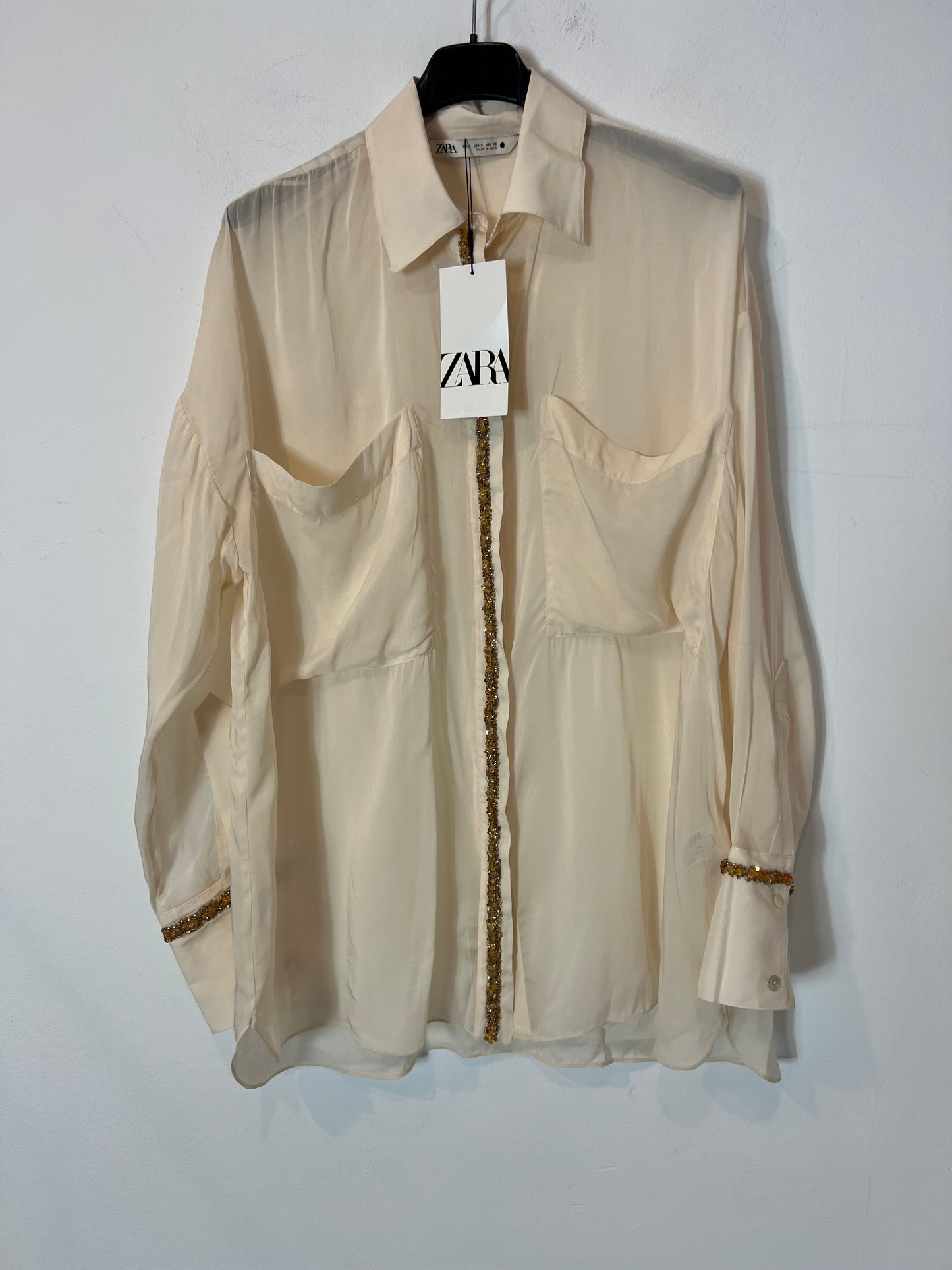 ZARA. Blusa fluida detalle pedrería. T S