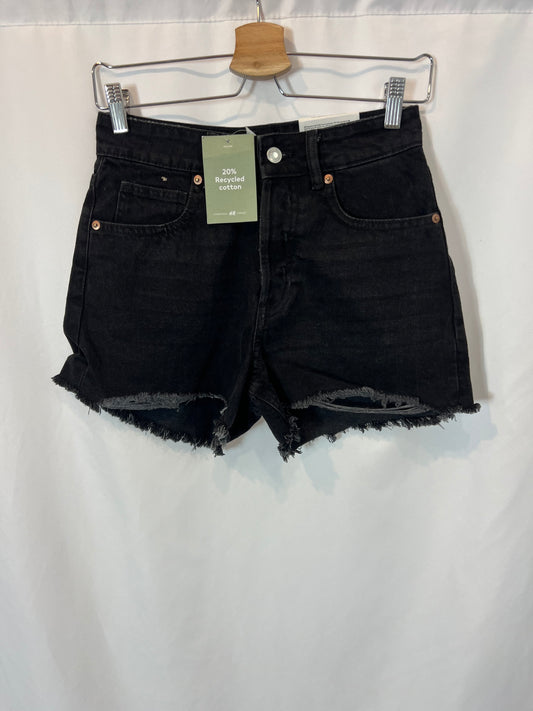 H&M. Denim short abotonado. T 36