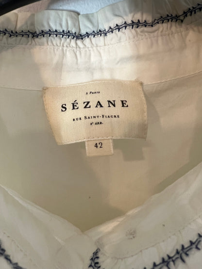 SEZANE. Blusa blanca sin mangas detalles T.42