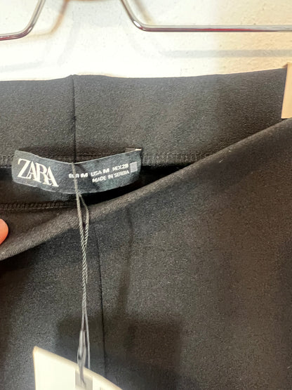 ZARA. Pantalón negro elástico. T M