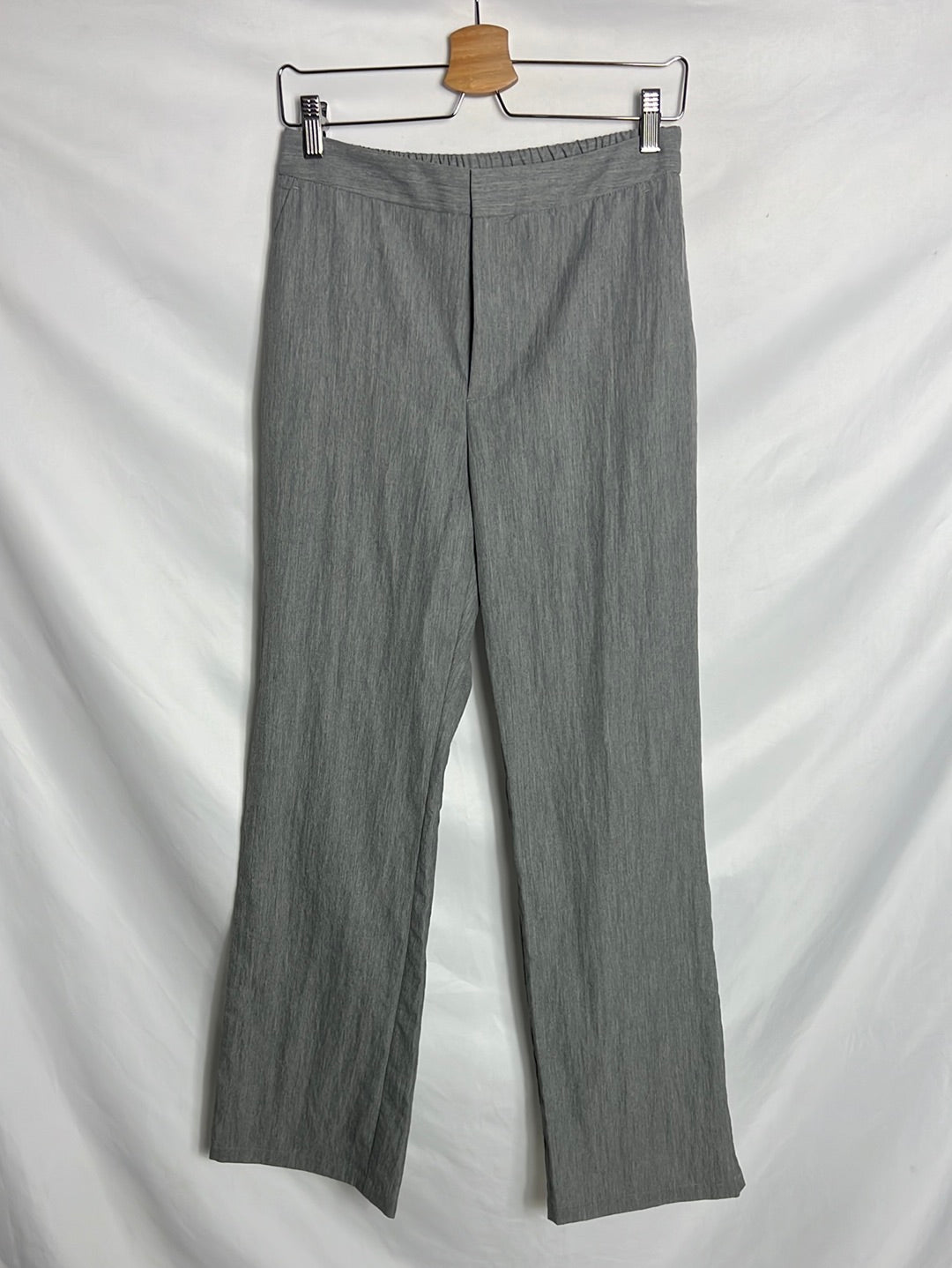 TCN. Pantalón gris jaspeado pata ancha. T 38