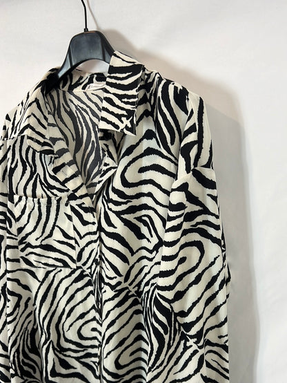 LTL STORE. Blusa fluida animal print T.s