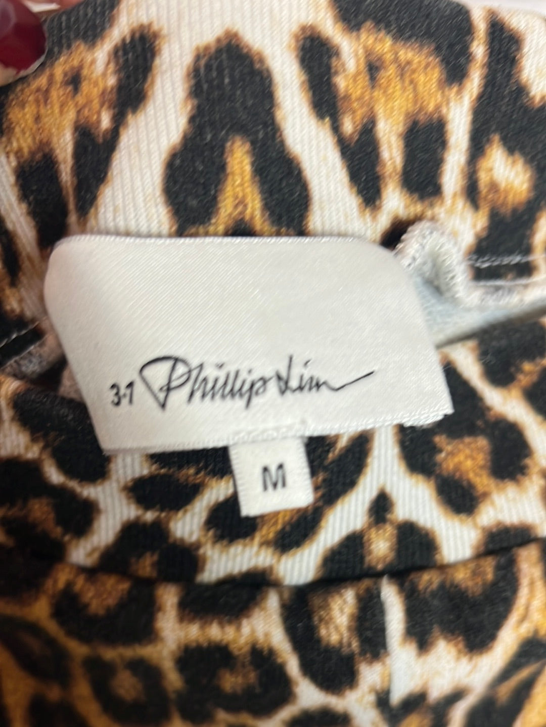 PHILIP LIU. Pantalón felpa animal print. TM