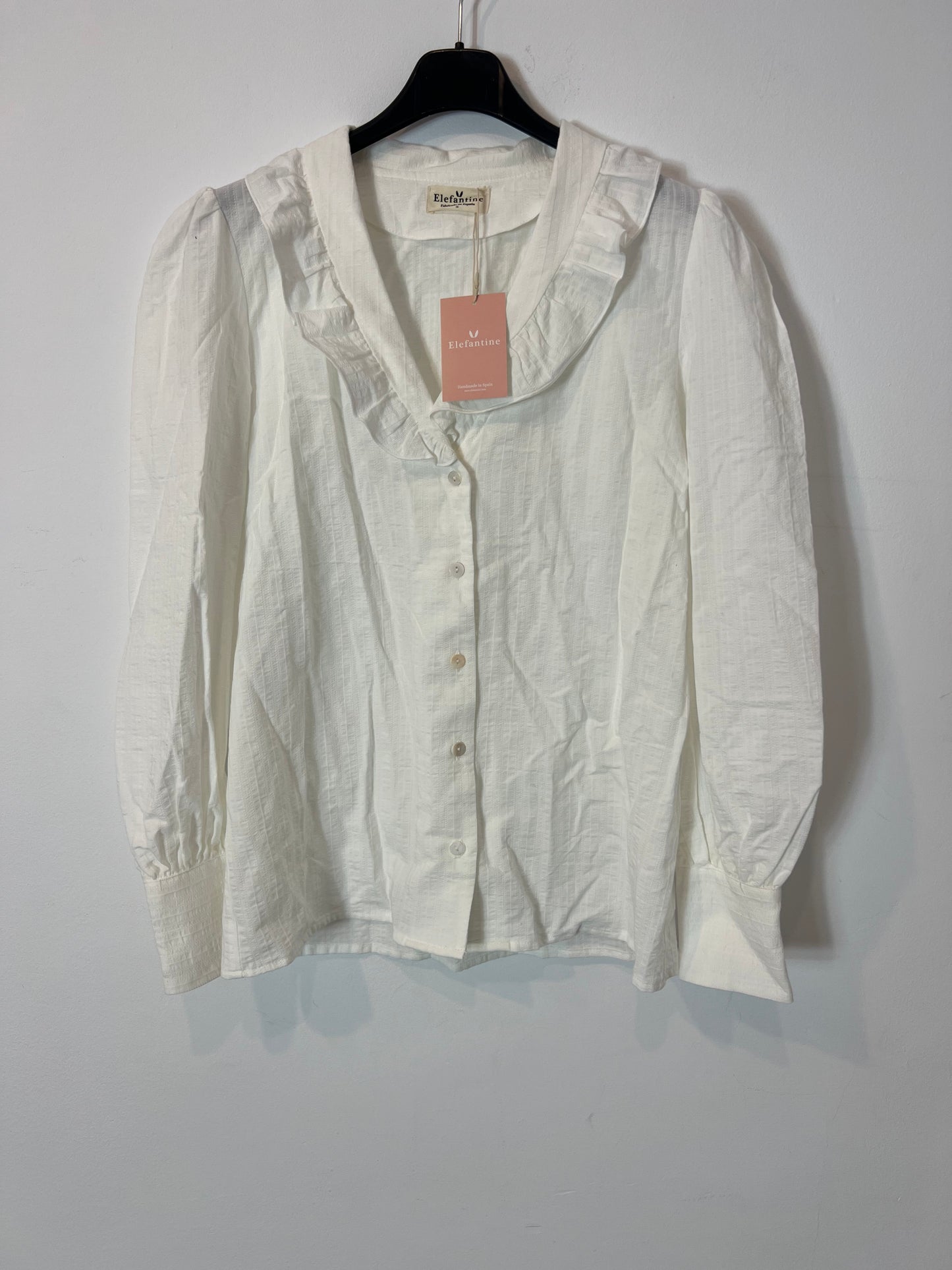 ELENFANTINE. Blusa blanca cuello volante T.s