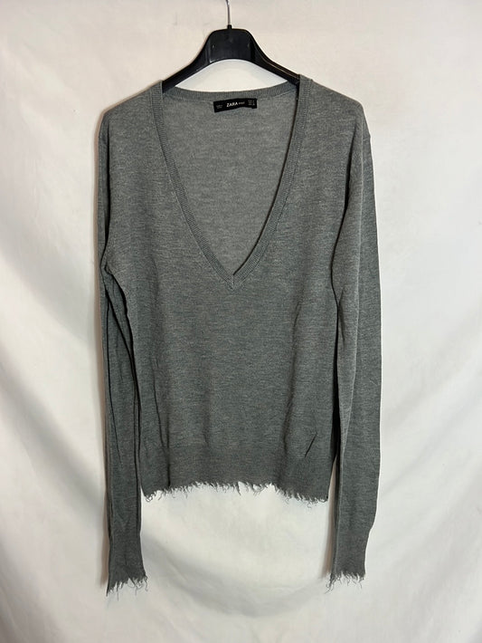 ZARA. Jersey gris fino detalle  bajos. T M