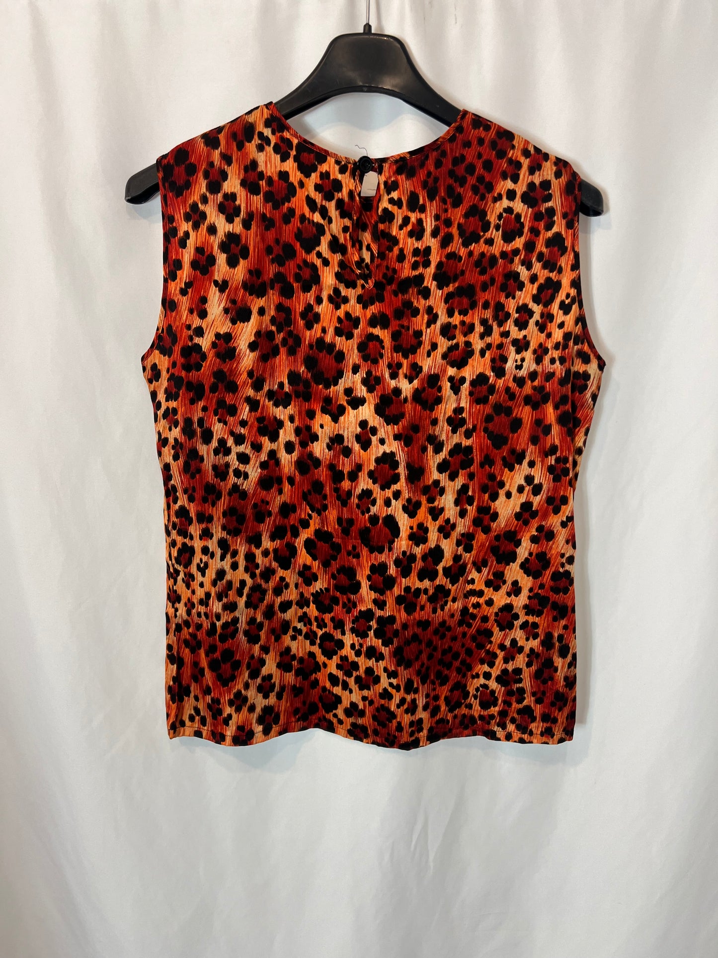 YVES SAIN LAURENT. Top animal print seda. T 38