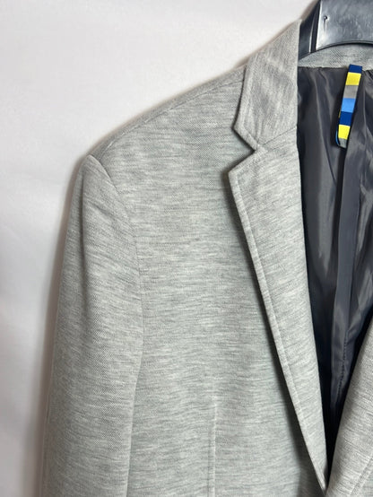 RESERVED. Blazer gris jaspeada detalles flúor . T S