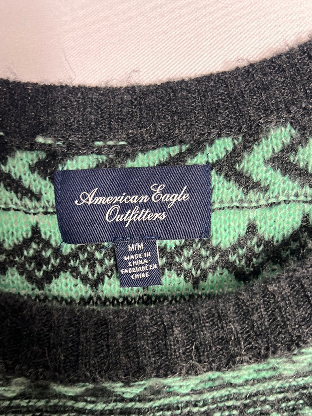 AMERICAN EAGLE. Jersey verde y gris apertura . T M