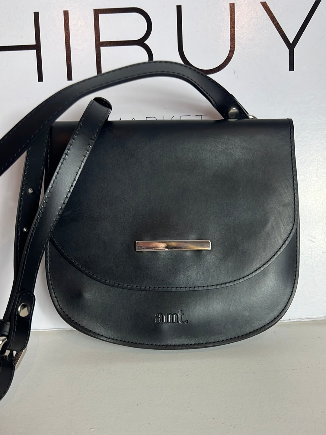 AMT. Bolso mini negro plano