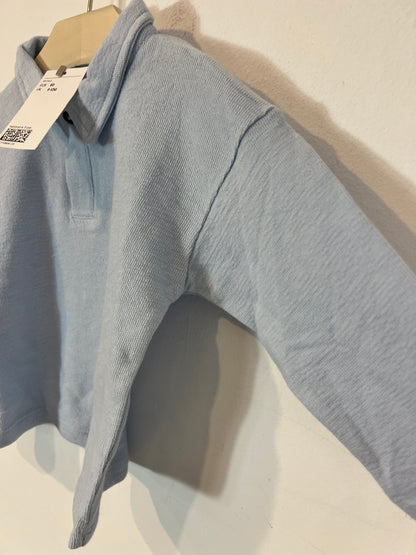 H&M. Polo azul claro textura. T 9-12 meses