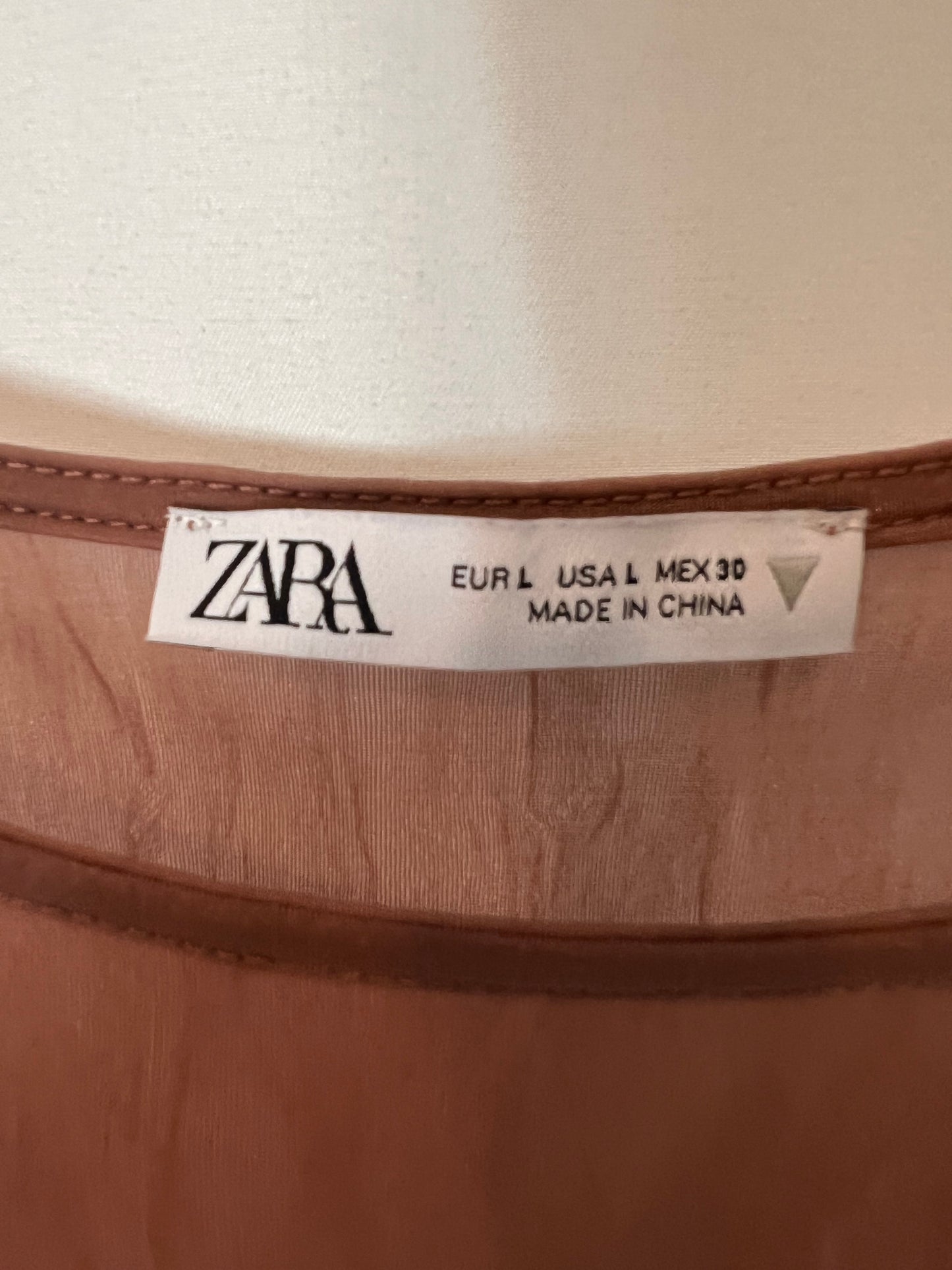 ZARA. Body rosa semitransparente T.l