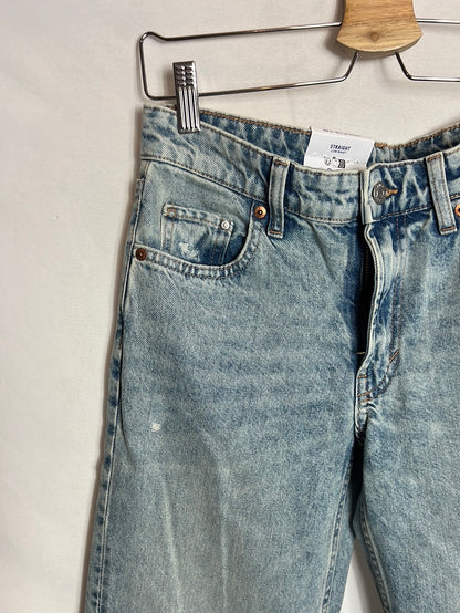 H&M. Denim efecto desgastado apreturas. T 34