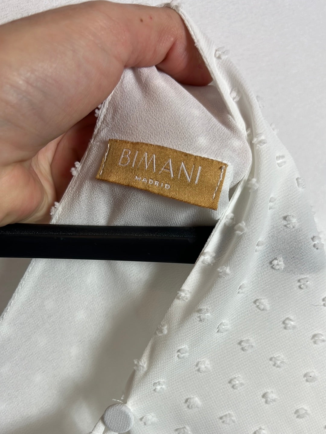 BIMANI. Blusa blanca plumeti. T M