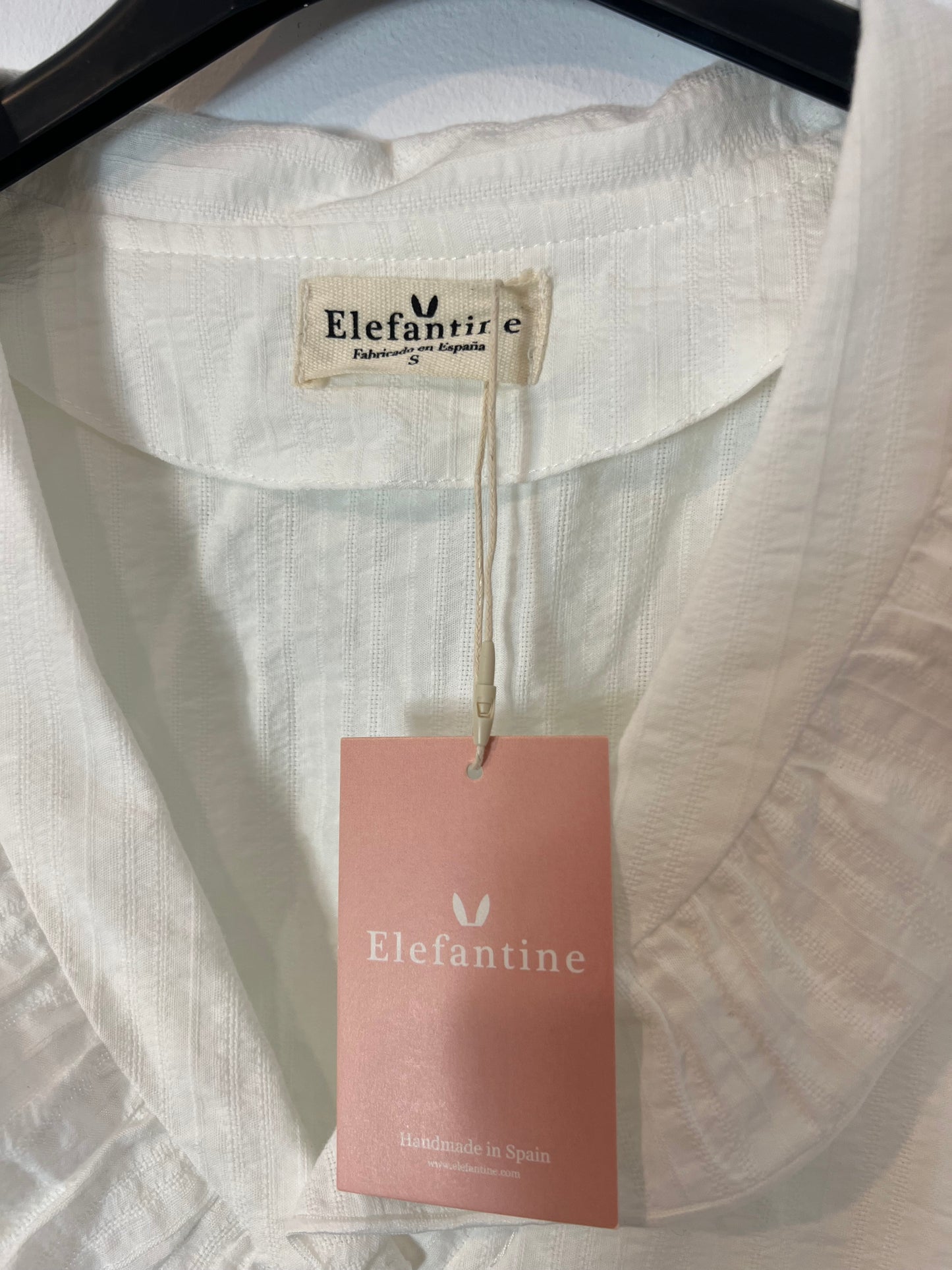 ELENFANTINE. Blusa blanca cuello volante T.s