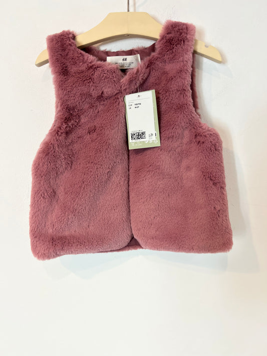 H&M. Chaleco pelo rosa. T 4- 6 años