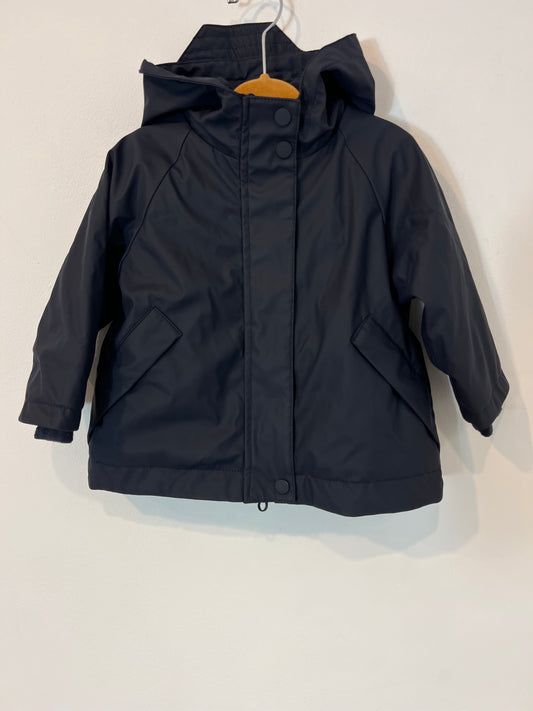 ZARA. Abrigo azul impermeable. T 9-12 meses