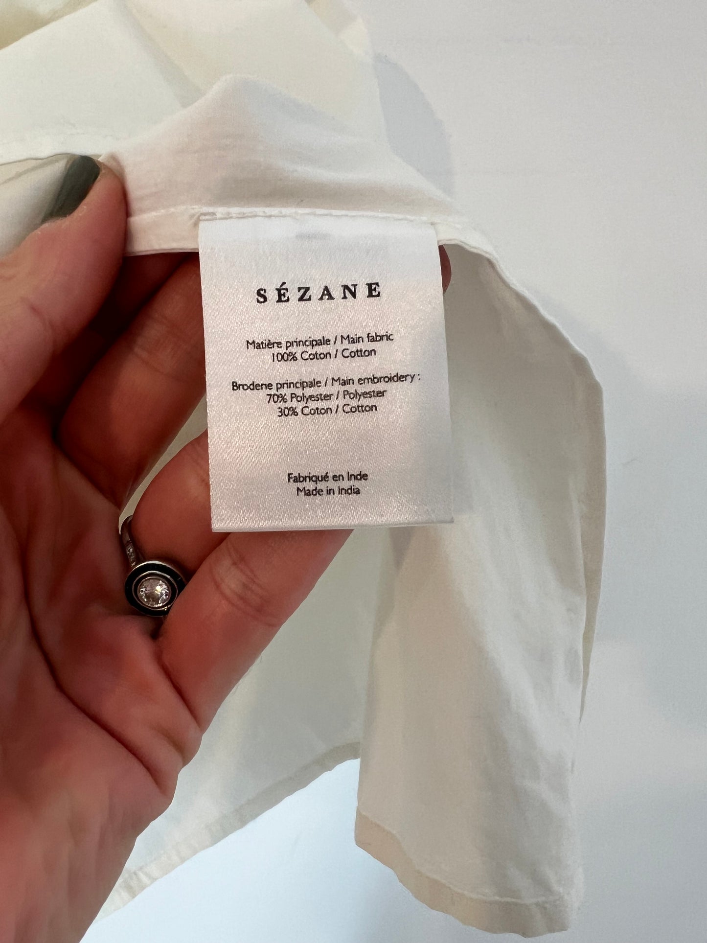 SEZANE. Blusa blanca sin mangas detalles T.42