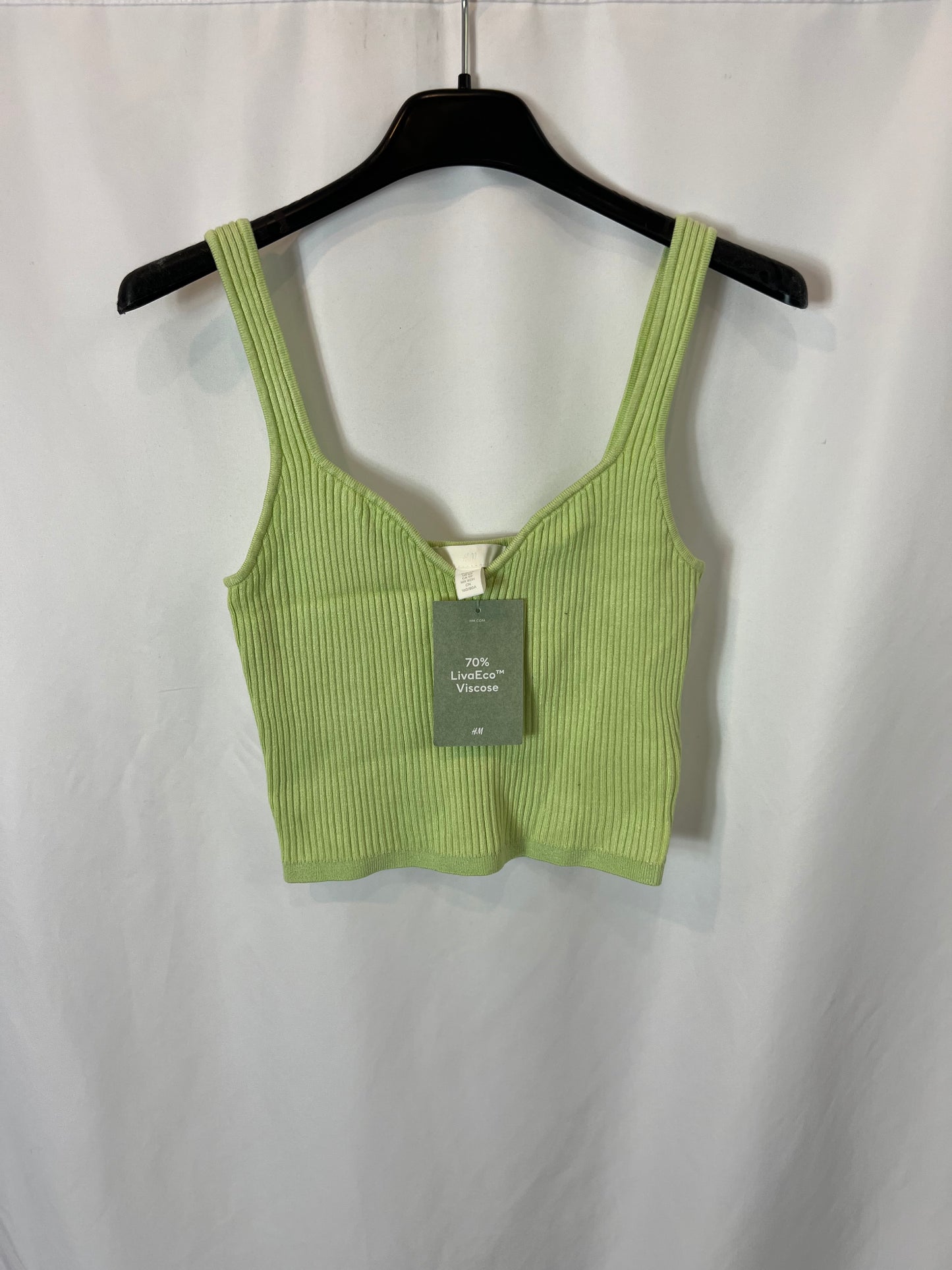 H&M. Top punto verde canalé T.s