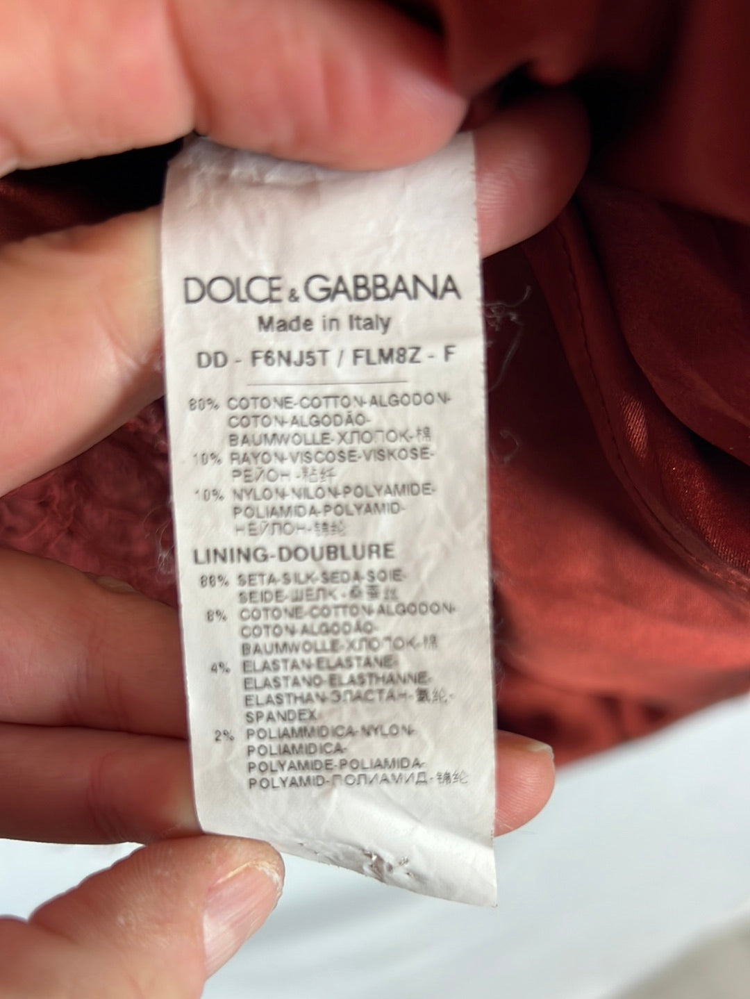 DOLCE&GABANNA. Vestido burdeos troquelado. T 44 (M)