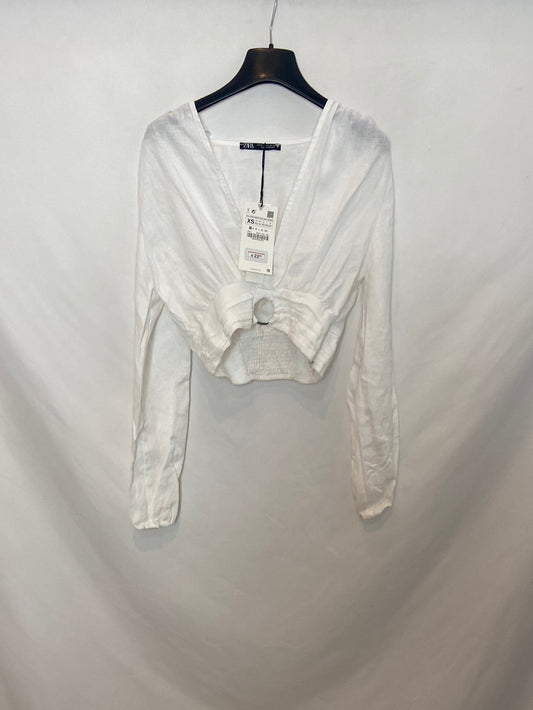 ZARA. Top blanco escote T.XS