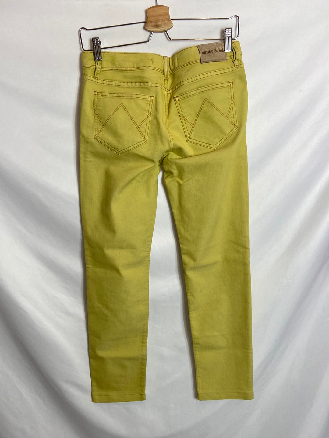 BIMBA Y LOLA. Pantalón denim amarillo T.38