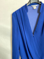 H&M. Blusa azul semitransparente T.34