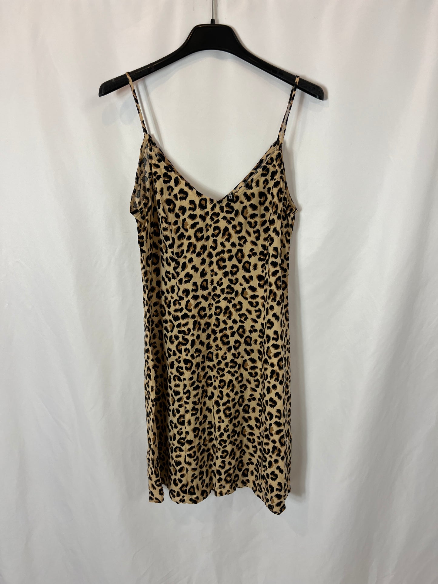 H&M. Vestido corto animal print T.34