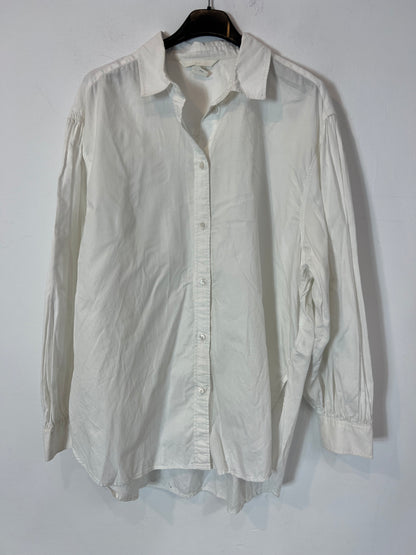 H&M. Blusa blanca fluida abotonada T.s