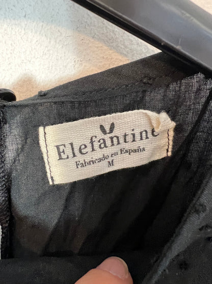 ELEFANTINE. Blusa negra plumeti detalle volante. T M