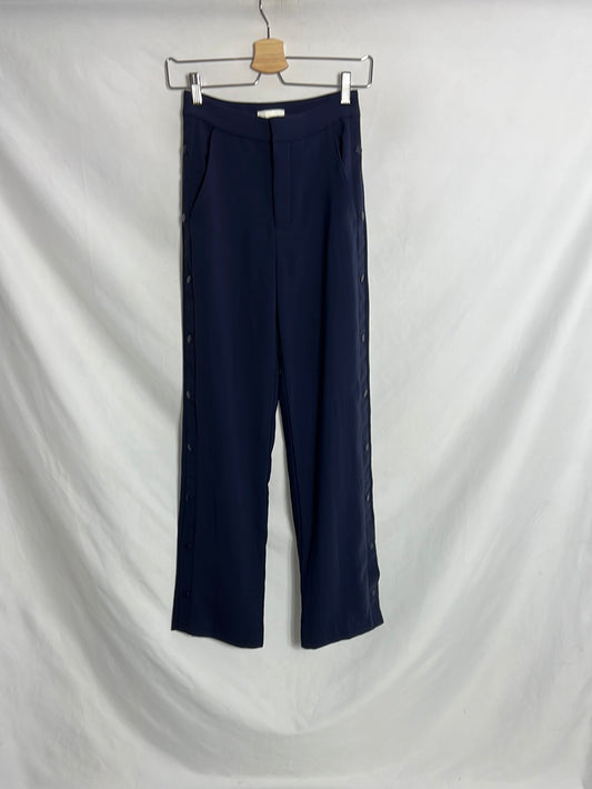 H&M. Pantalón azul palazzo abotonado. T 32