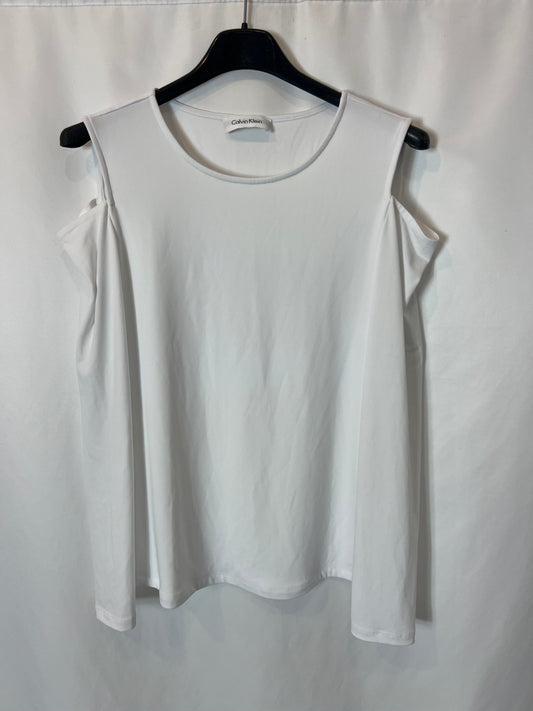 CALVIN KLEIN. Top blanco elástico hombros. T S