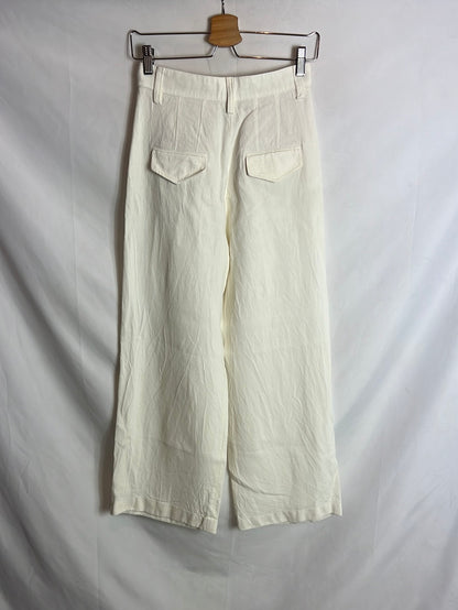 Buscar ZARA. Pantalones textura color crudo. T XS