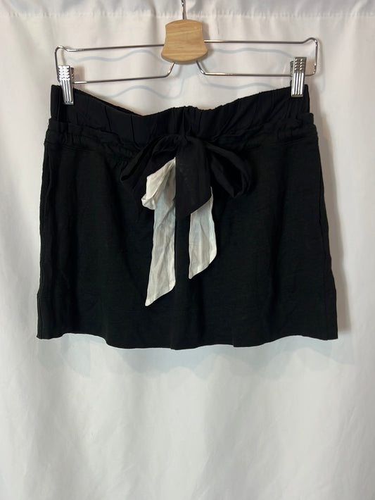 SANDRO. Falda corta negra detalle lazada. T 3 (M/L)