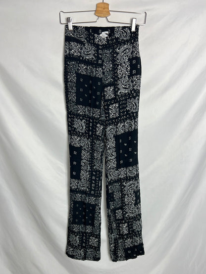 SCALPERS. Pantalón fluido azul oscuro estampado . T S