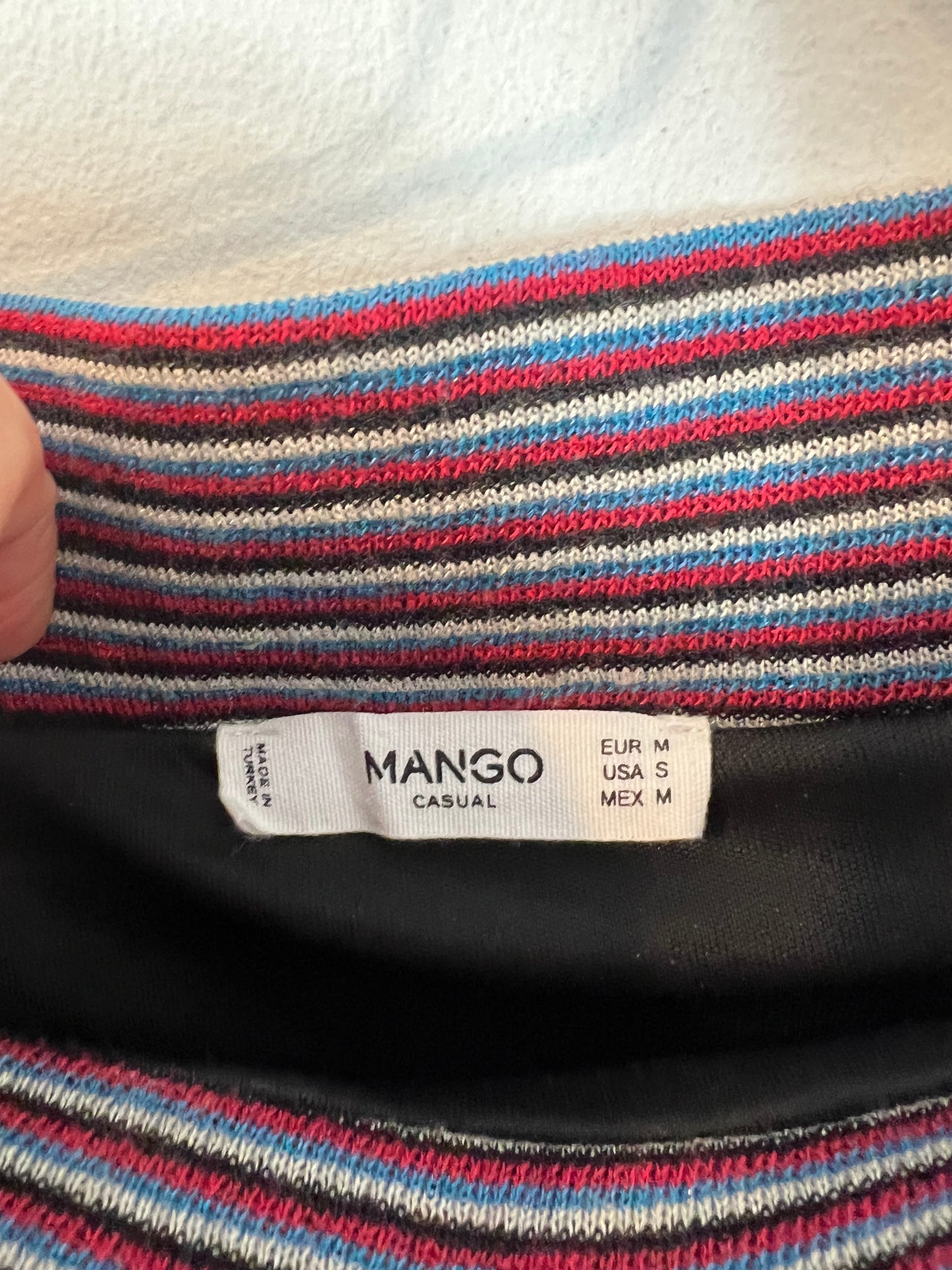 MANGO. Falda midi punto elástico. T M