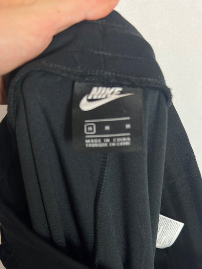 NIKE. Pantalón negro terciopelo . T M