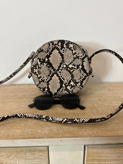 MANGO. Bolso redondo animal print