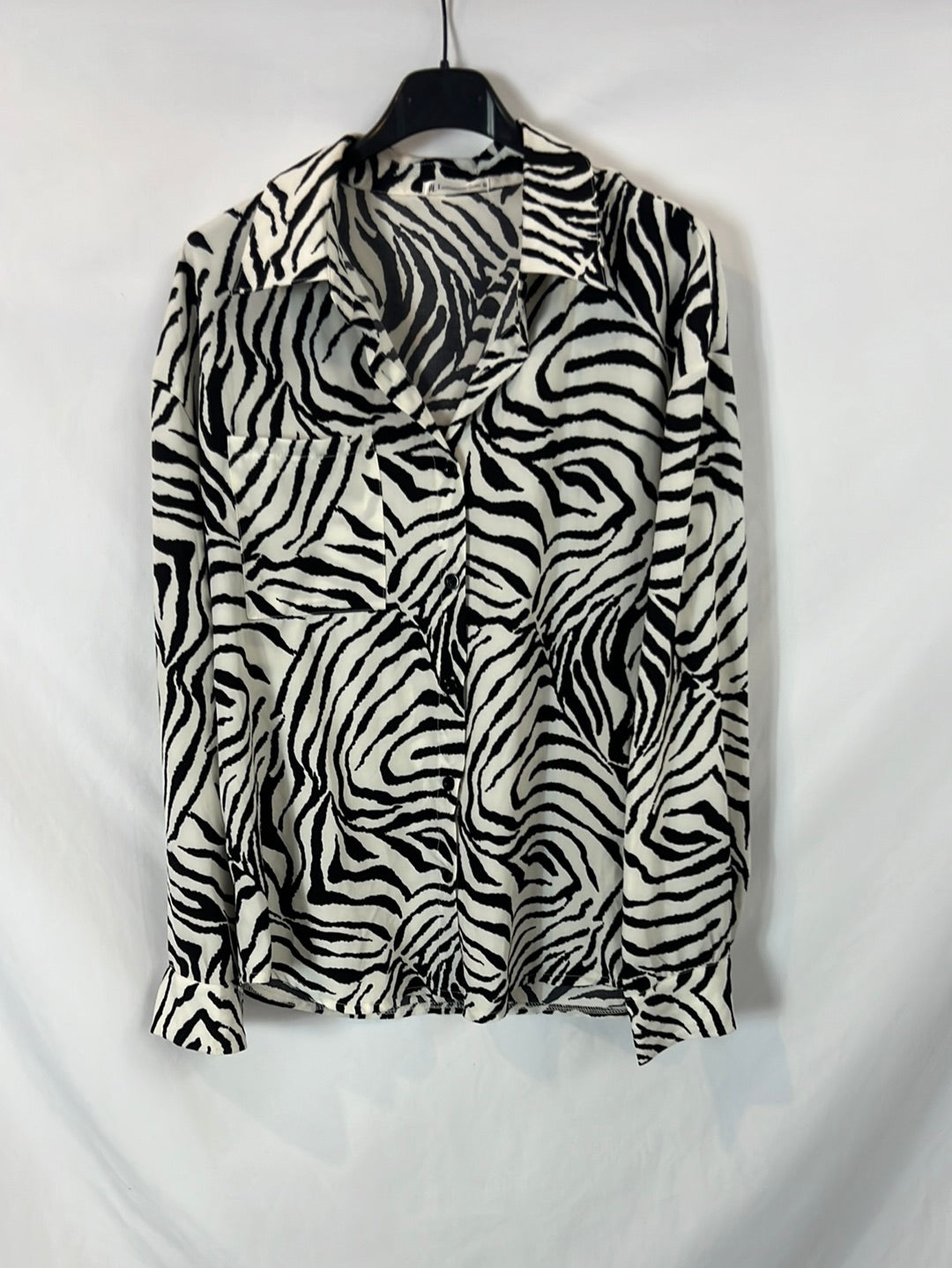 LTL STORE. Blusa fluida animal print T.s